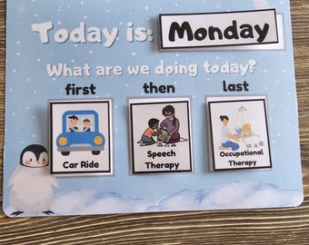 May include: A visual schedule for a child's day, with a blue background and a penguin illustration. The schedule shows the day is Monday, and the activities are a car ride, speech therapy, and occupational therapy.