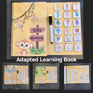 May include: A yellow and brown book with a spiral binding. The front cover features a cartoon monkey and the words "Silly Monkeys" and "Adapted Learning Book". The back cover has a variety of colorful images and numbers.