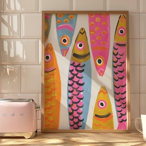 Colorful pastel sardine wall art featuring watercolor fish on an off-white background, printable coastal kitchen decor for Mediterranean homes, beach house kitchens, dining room wall art, nautical decor, Hamptons style interiors, seafood lover gift, colorful fish illustration, instant digital download printable artwork.