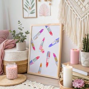 Digital download of pink lipstick wall art print in watercolor style, perfect for girly room decor, coquette aesthetic, preppy dorm style, and college apartment decorations. Features a collection of elegant lipsticks in various shades, ideal makeup poster for beauty lovers. Feminine and chic fashion wall art for teen bedroom, vanity area, glam room, or salon. Printable makeup decor to instantly elevate your space with soft, stylish beauty illustrations.
