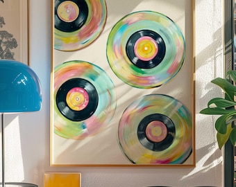 Könnte beinhalten: Ein gerahmtes Gemälde von vier bunten abstrakten Schallplatten auf weißem Hintergrund.