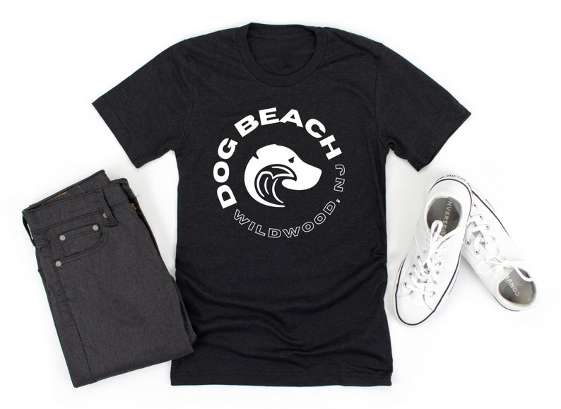 May include: Black t-shirt with a white circle graphic that says "Dog Beach Wildwood, NJ" with a dog head silhouette inside the circle.