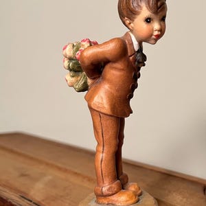 ANRI Carved Boy Figurine with Flower Bouquet