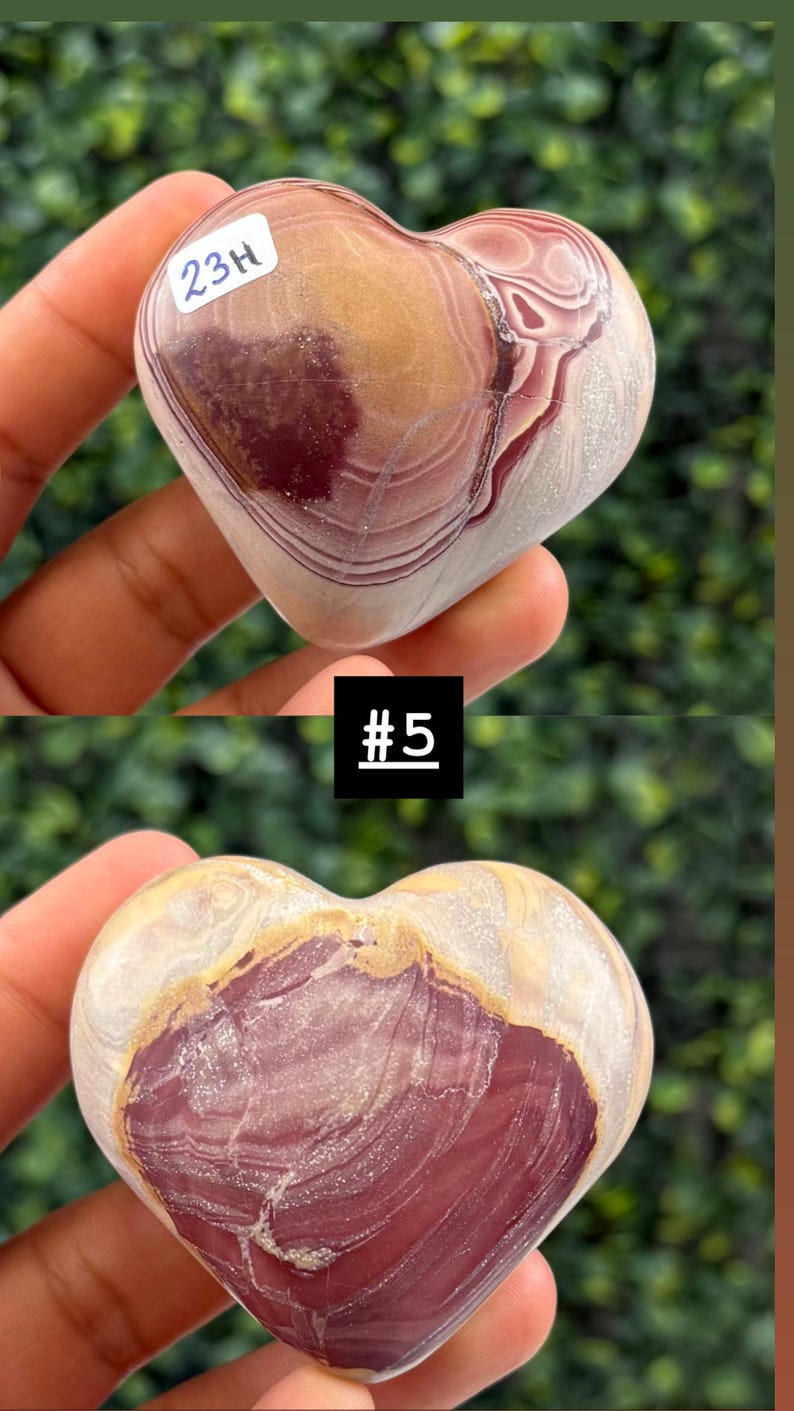 May include: Heart-shaped stone with a mix of colors, including burgundy, tan, and cream. The stone has a polished surface with natural patterns and veining. The top image has the text "23H" on a white sticker. The bottom image has the text "#5" on a black square.