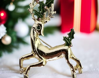 Vintage kerstbroche Vintage rendierbroche jaren 60 vintage vakantie goudkleurige roodgroene hertenspeld feestelijke Gerrys Kitsch Retro Kitschmas-speld