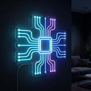 May include: A neon sign shaped like a computer processor, with a central square and radiating lines. The sign glows with blue and purple neon lights, mounted on a dark wall. The design evokes technology and modern decor.