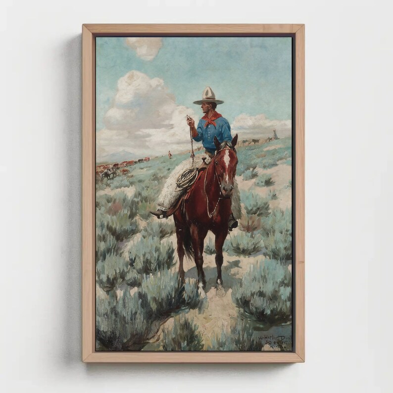 May include: A painting of a cowboy riding a brown horse through a field of sagebrush. The cowboy is wearing a blue shirt, a brown hat, and jeans. The sky is blue with white clouds.