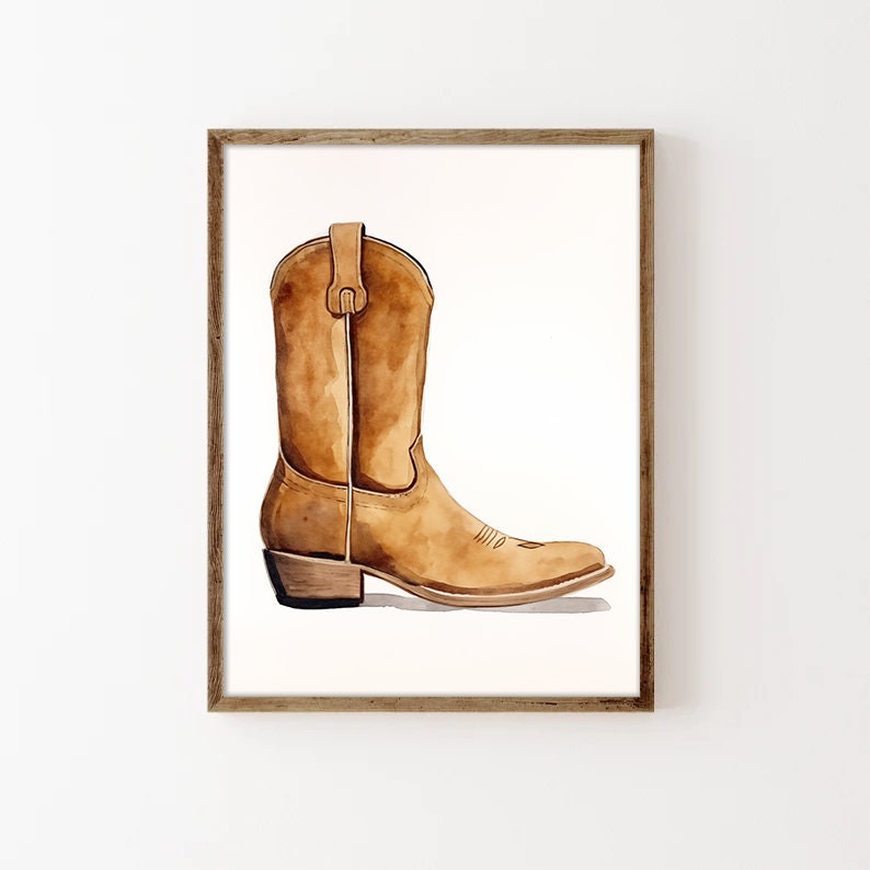 May include: A watercolour painting of a brown cowboy boot with a pointed toe and a slight heel. The boot has a decorative stitching pattern on the toe and a pull tab on the back.