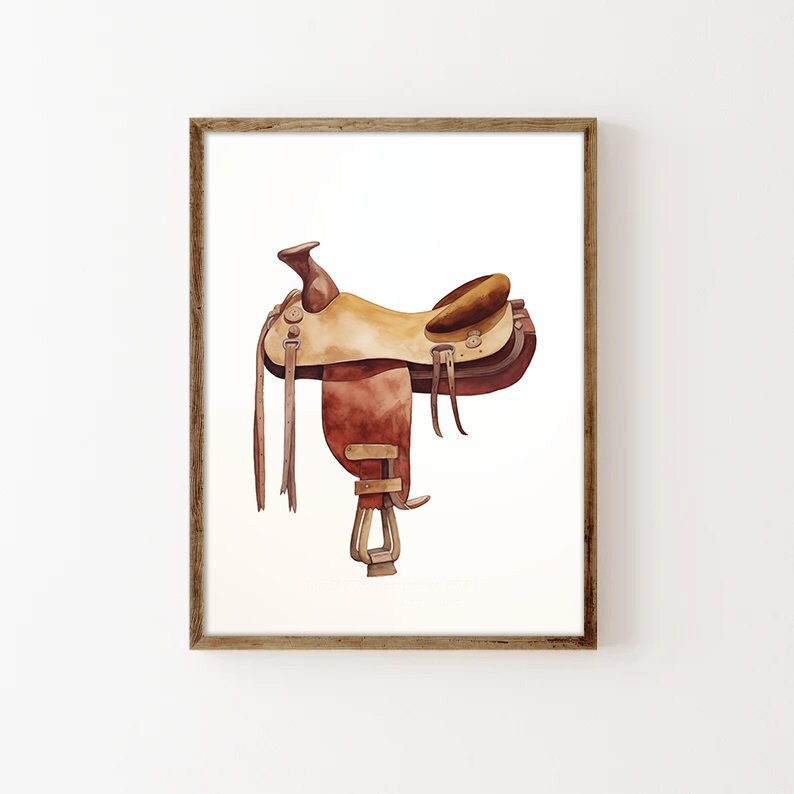 May include: A watercolour painting of a brown leather saddle with a light brown seat and stirrups. The saddle is depicted against a white background.