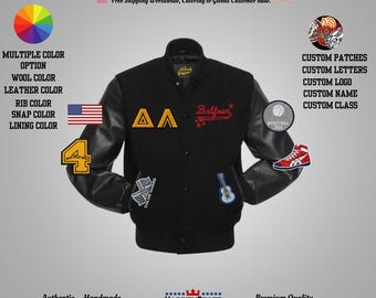 May include: A black varsity jacket with leather sleeves. The jacket features multiple patches, including a basketball, a guitar, and the number 4. The text "Balfour" is embroidered in red. The jacket is customizable with multiple color options.