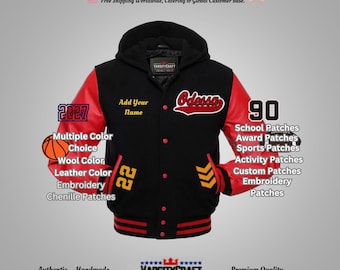 May include: A black and red varsity jacket with a hood, featuring the word "Odessa" in red script. The jacket has a "90" patch and the number "22" in yellow. Additional text includes "Add Your Name" and "2027".