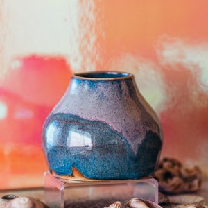 Handmade, one-of-a-kind vase, with dripping effect over the top.