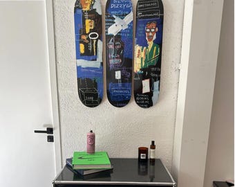 Arte en patineta de jugadores de trompeta de Basquiat