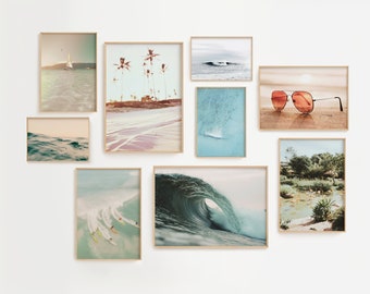 May include: A collection of framed photographs featuring various beach scenes, including palm trees, ocean waves, surfers, and sunglasses.