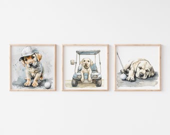 Könnte beinhalten: Drei Aquarelle eines Labrador-Welpen. Das erste Bild zeigt den Welpen mit einer Baseballkappe und einem Golfball in der Hand. Das zweite Bild zeigt den Welpen in einem Golfwagen. Das dritte Bild zeigt den Welpen, der mit einem Golfschläger und einem Ball auf dem Boden liegt.