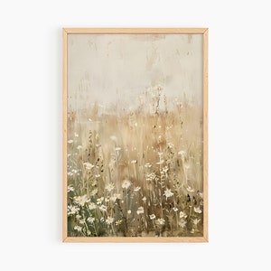 May include: A framed painting of a field of white wildflowers with a soft, muted color palette. The background is a hazy, light brown and gray.