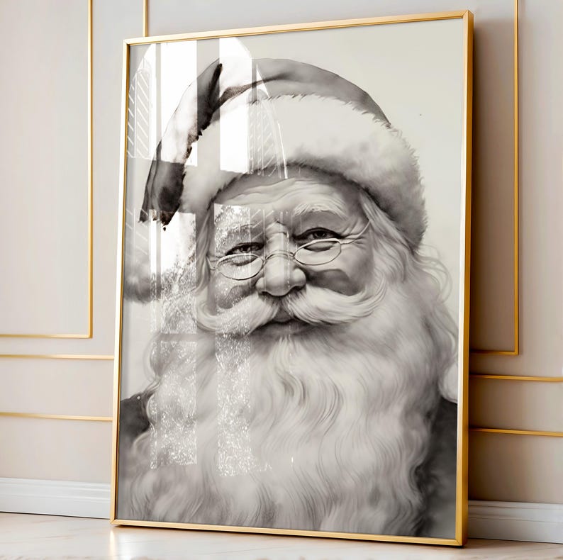 May include: Black and white framed print of Santa Claus. The portrait features Santa with a long white beard, glasses, and a traditional hat. The artwork is encased in a gold-colored frame, adding a touch of elegance to the holiday-themed decor.