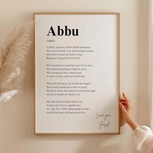 May include: A framed print with the word "Abbu" at the top, followed by a poem. The print has a wooden frame and the text is in black. The words "Love you Yusuf" are written at the bottom right corner.