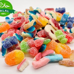 May include: A variety of colorful gummy candies, including rings, bears, and bottles, with a Halal 100% certification label.