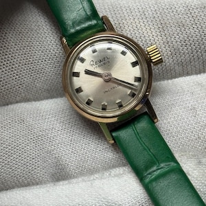 Vintage Ladies’ Swiss Rewel 17 Jewel Watch - Gold-Tone, Green Strap, Fully Working