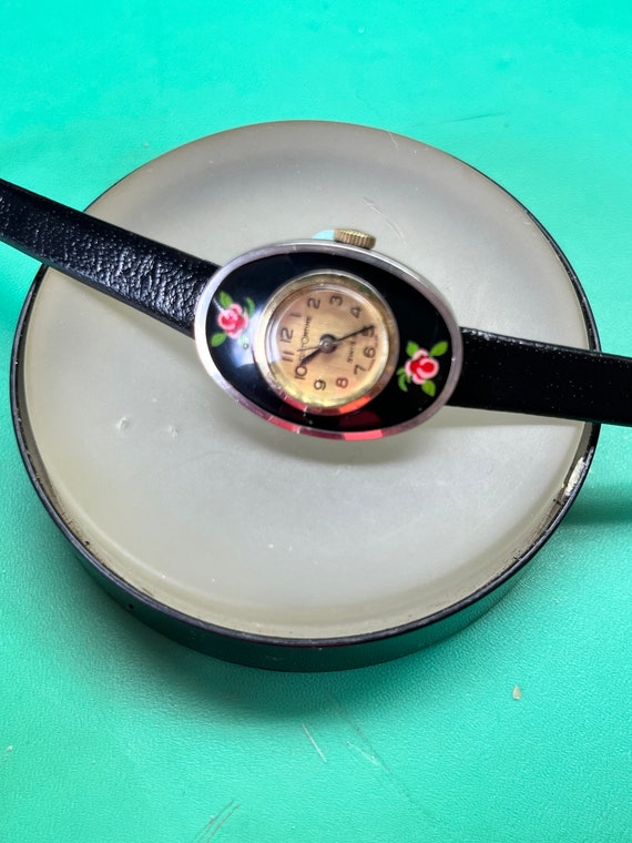 Lovely antique girls watch with a gothic /hippie v