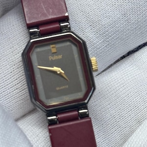 Vintage Ladies Pulsar watch by Seiko - thin design - Burgundy/Maroon with Gold Accents. Reference V232 1590