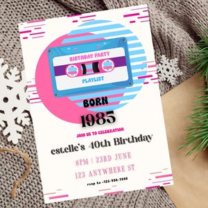 May include: A birthday party invitation with a retro cassette tape design. The invitation features a blue and pink color scheme with the text "Birthday Party," "Playlist," "Born 1985," and details for a 40th birthday celebration.