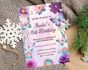 May include: A birthday party invitation with a watercolor design. The invitation features butterflies, flowers, and dream catchers. The text reads "You're Invited to Isabel's 6th Birthday" with party details. The color palette includes pink, purple, and blue.