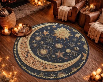 May include: A circular rug featuring a dark navy blue background with a large golden crescent moon and sun motif. The design includes various embroidered-style celestial elements such as stars, sunbursts, and floral patterns in shades of gold.
