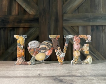 Yooper LOVE resin art with Fluorescent Sodalite stone (Yooperlite, tm.) and a variety of rocks from Lake Superior’s Upper Peninsula shores.