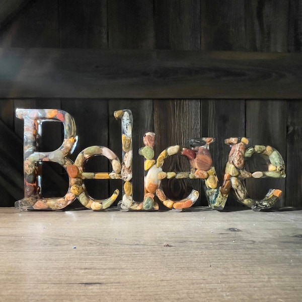 BELIEVE resin rock art with pebbles from the Michigan beaches of the Great Lakes.  Stones are collected from Upper Peninsula shores.