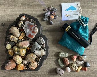 Beautiful & Educational Michigan Rock Treasure Box with Great Lakes Stones, ID Book, 5 Fluorescent Sodalites, and a Yooperlite Flashlight.