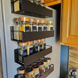 Spice rack next to fridge new arrivals