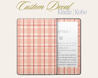 以下が含まれることがあります： KindleまたはKobo電子書籍リーダー用のカスタムデカール。デザインは、クリームと赤の色合いのチェック柄が特徴です。電子書籍リーダーは本のページを表示します。デカールのテキストは「Custom Decal」と「Kindle | Kobo」と書かれています。