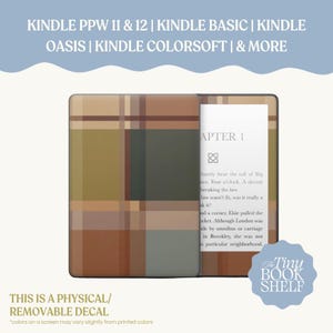 May include: A Kindle e-reader skin featuring a brown, tan, and dark gray plaid pattern. Text at the top reads: KINDLE PPW 11 & 12 | KINDLE BASIC | KINDLE OASIS | KINDLE COLORSOFT | & MORE. Text at the bottom reads: THIS IS A PHYSICAL/REMOVABLE DECAL.