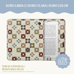 May include: A removable decal for Kobo Libra 2, Kobo Clara, and Kobo Color e-readers. The decal features a repeating geometric pattern of small squares in shades of brown, tan, olive green, and cream. The e-reader displays text on its screen.