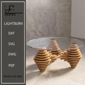 Puede incluir: Una mesa de centro de madera con tapa de cristal. La mesa tiene un diseño único y en capas con un patrón de espiral. La mesa está hecha de madera marrón claro y tiene un estilo moderno y minimalista.