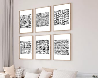 May include: Six framed art prints featuring black Arabic calligraphy on white backgrounds. The prints are in wooden frames and are arranged in a grid on a light-coloured wall. The calligraphy is intricate and decorative, with a modern aesthetic.