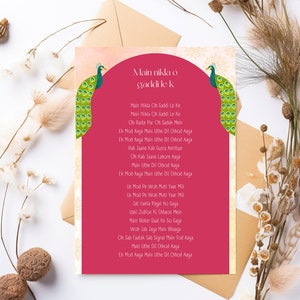 May include: A red and gold card with a peacock design and text in Hindi. The text reads "Main nikla o gaddi le k" which translates to "I left in a car".
