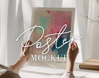 Poster mockup person PSD JPG, ISO A4 mock up woman holding art print, simple minimal empty paper blank wall art, close up hand with shadow