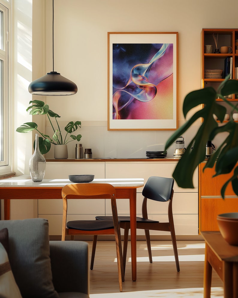 A cosy corner of a neutral wood kitchen with sunlight streaming in. A large framed artwork in on the wall
