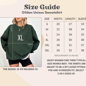 May include: Size chart for a Gildan unisex sweatshirt. The chart shows the width, length, and sleeve length in inches for sizes S through 3XL. The model is wearing a size XL sweatshirt.