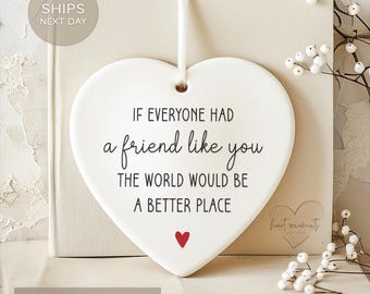 May include: White ceramic heart-shaped ornament with the text "If everyone had a friend like you the world would be a better place".