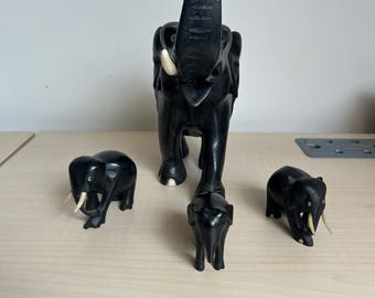 Large ebony hand carved wooden vintage elephant with family set.