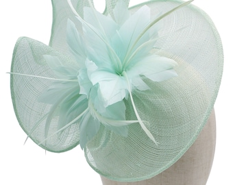 baby blue fascinator wedding hat races ascot derby wavy shaped with headband and clip feathers floral style