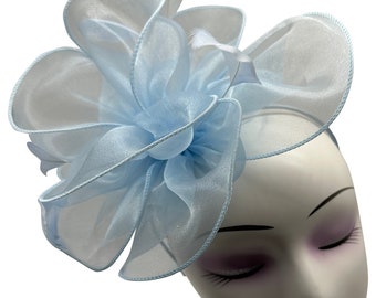 light blue fascinator hat with headband and clip, wave shaped with feathers, for weddings, royal ascot, garden parties and races