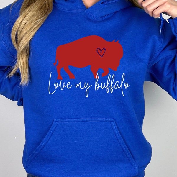 May include: Royal blue hooded sweatshirt with a red buffalo silhouette and a small heart inside. The text "Love my buffalo" is printed below the buffalo.