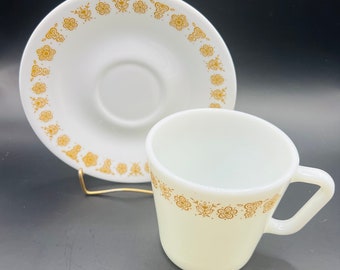 Vintage Pyrex Bufferfly Gold mug and saucer.