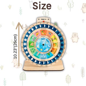 May include: Wooden educational calendar with a circular design. The calendar features the days of the week, months, seasons, and a moon phase indicator. The calendar is 10.23 inches (26cm) tall and has the word "Size" at the top.