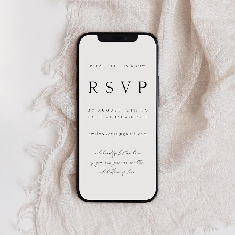 May include: A smartphone screen displaying a wedding RSVP request with the text "PLEASE LET US KNOW RSVP BY AUGUST 12TH TO KATIE AT 123.456.7788 emily&kevin@gmail.com and kindly let us know if you can join us in this celebration of love"